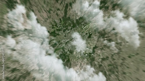 Zooming on Warsaw, Poland. Earth zoom in from outer space to city. The animation continues by zoom out through clouds and atmosphere into space. View of the Earth at night. Images from NASA. 4K
