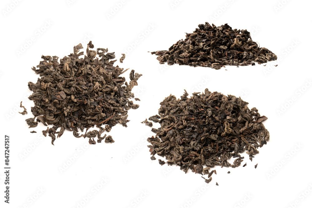 Dried tea leaves isolated on a white background. Dried tea leaves isolated on a white background.