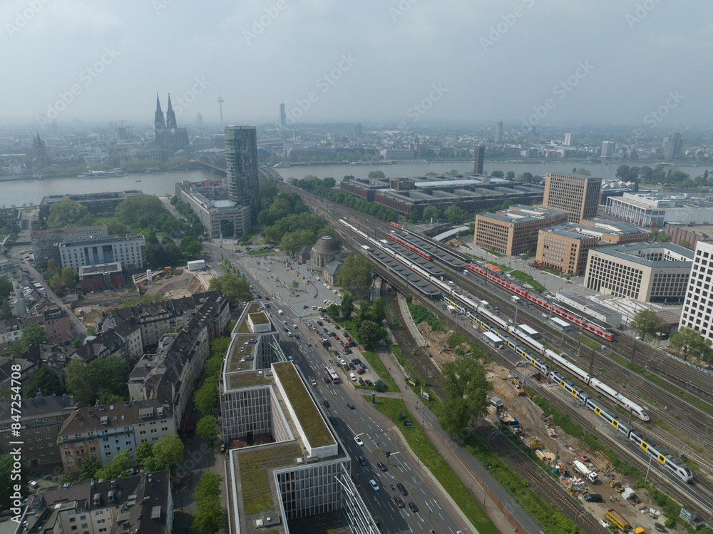 Fotografie Skyline of Cologne, cologne cathedral, rhine river, colonius tv tower, severinbrucke bridge, rail way station, roads and infrastructure