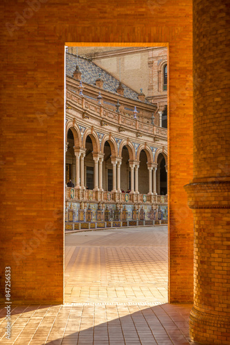 Looking through the archways to the Towers of the beautiful Plaza de Espana (translates to Spanish Square) in Seville, Spain. photo