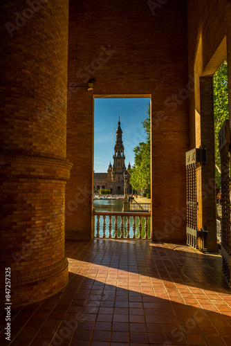 Looking through the archways to the Towers of the beautiful Plaza de Espana (translates to Spanish Square) in Seville, Spain. photo