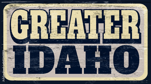 Aged and worn greater Idaho sign on wood