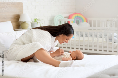 Happy young mother bonding ...
