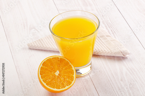 Sweet fresh orange juice in the glass