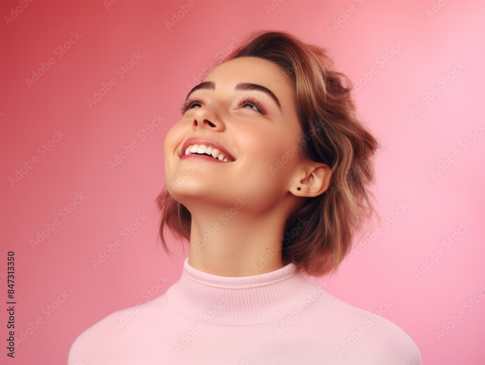 A woman wearing a white turtle neck sweater looks up with a thoughtful expression A woman wearing a white turtle neck sweater looks up with a thoughtful expression