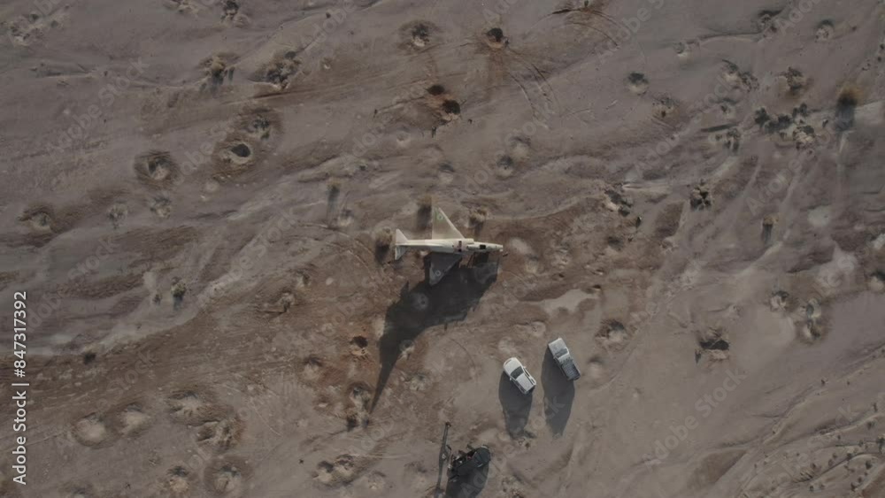 Aerial video of an abandoned fighter plane in the desert, Israel Aerial video of an abandoned fighter plane in the desert, Israel