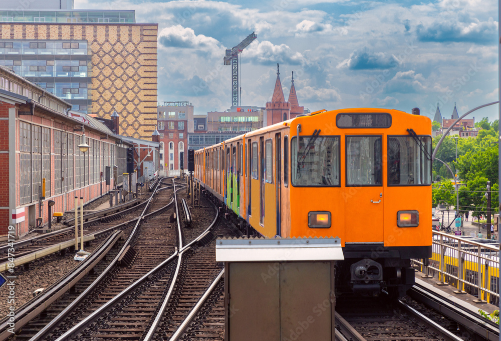 Yellow carriages of the famous Berlin metro on a sunny day. Yellow carriages of the famous Berlin metro on a sunny day.