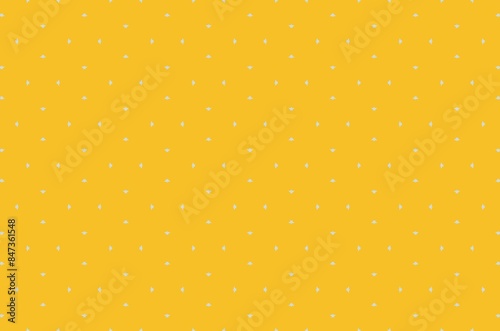 A yellow background with white dots