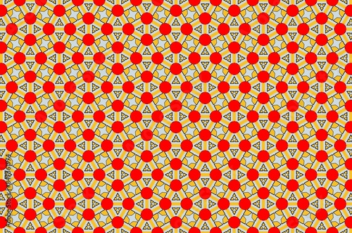 A pattern of red and yellow circles with a star in the middle