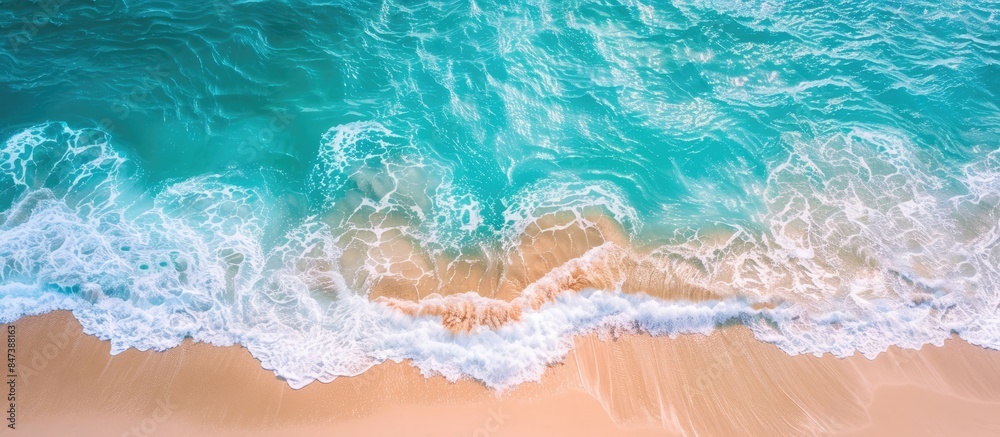 Captivating aerial perspective of sandy beach, ocean waves, turquoise water background, and summer seascape captured by a drone, conveying the essence of travel vacation. Captivating aerial perspective of sandy beach, ocean waves, turquoise water background, and summer seascape captured by a drone, conveying the essence of travel vacation.