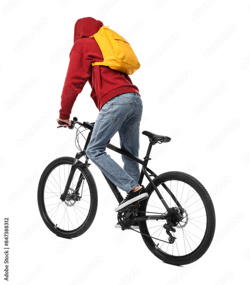 Obraz premium Man with backpack riding bicycle on white background