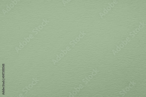 Sage green paper sheet as background, closeup