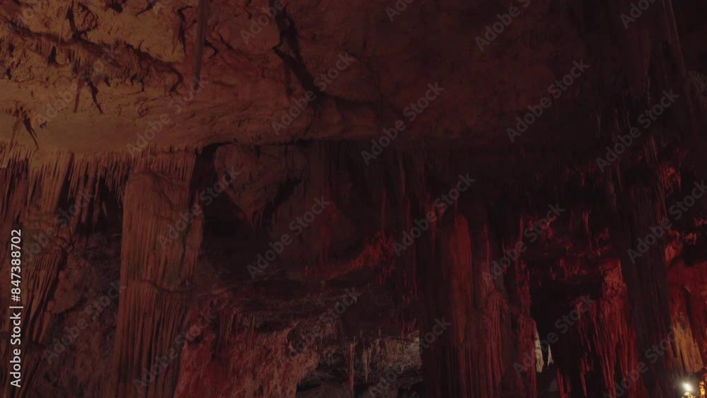 Alghero , Italy - 1 may 2024 Tourists visiting the Neptune Grotto touring a cavern full of stalactites. Alghero , Italy - 1 may 2024 Tourists visiting the Neptune Grotto touring a cavern full of stalactites.