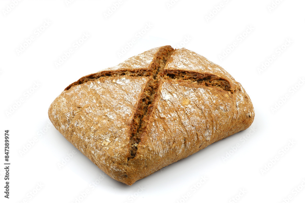 Sliced homemade sourdough rye bread with rye flour on white textured background. Top view or flat-lay.