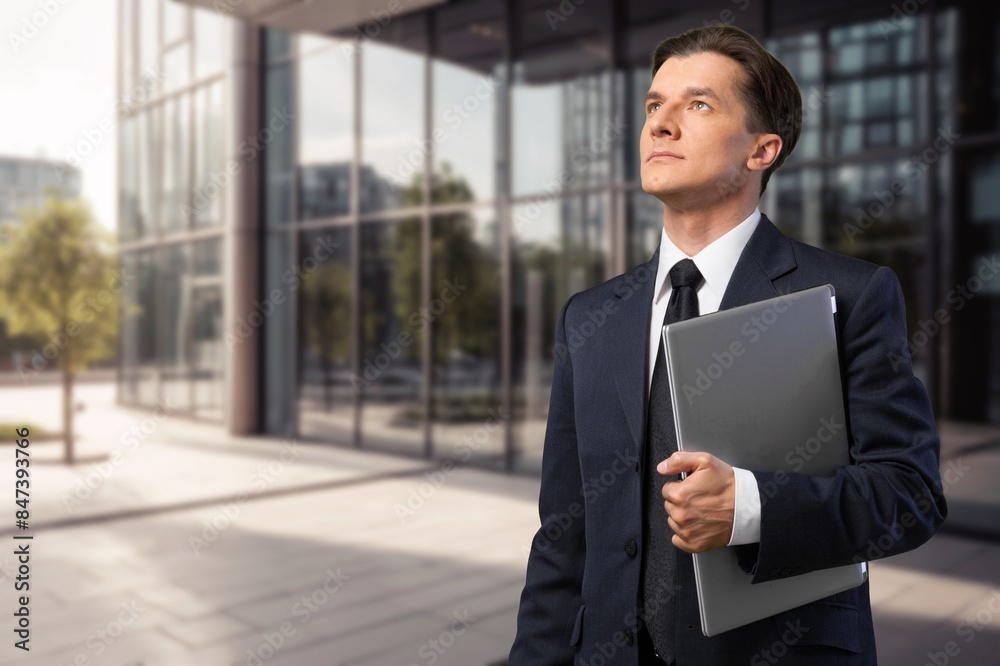 Business man walk on city street