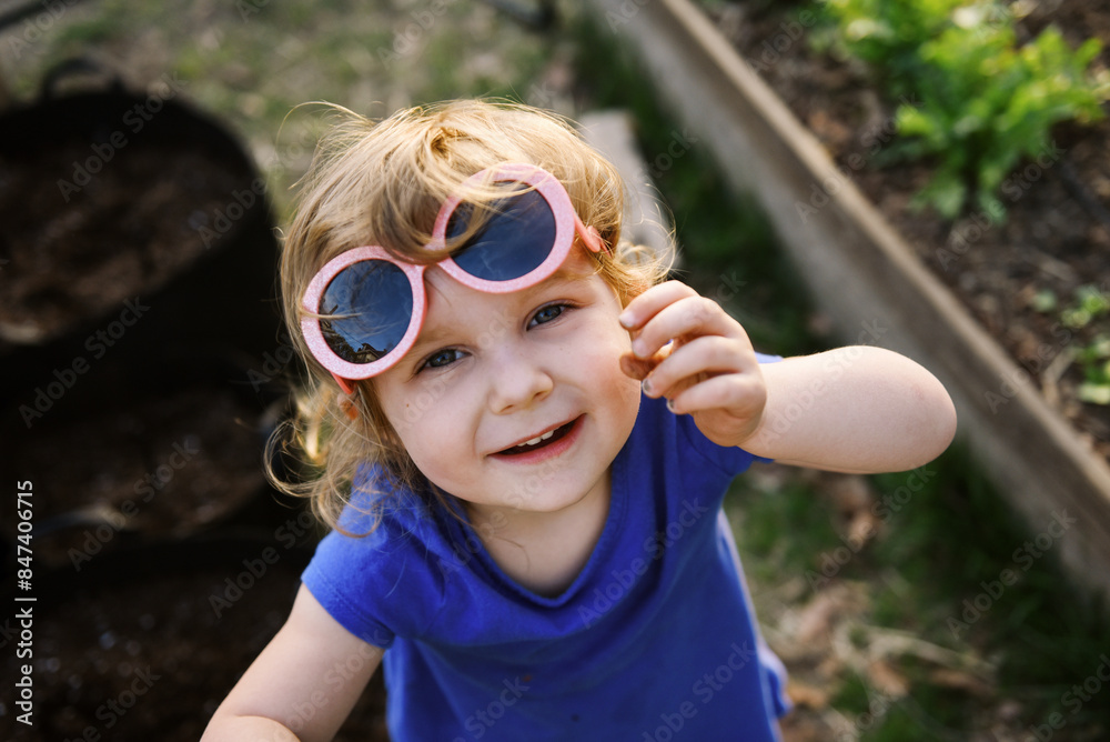 portrait of happy girl in garden in spring portrait of happy girl in garden in spring