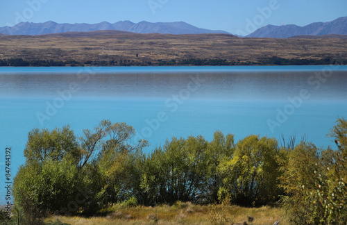 Beautiful lake landscape in autumn, water in turquoise colour, scenic view, Lake Pukaki, New Zealand, South Island