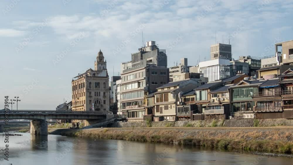 Cityscape skyline time lapse at Kamo river in a morning, Kyoto city, Japan. Cityscape skyline time lapse at Kamo river in a morning, Kyoto city, Japan.