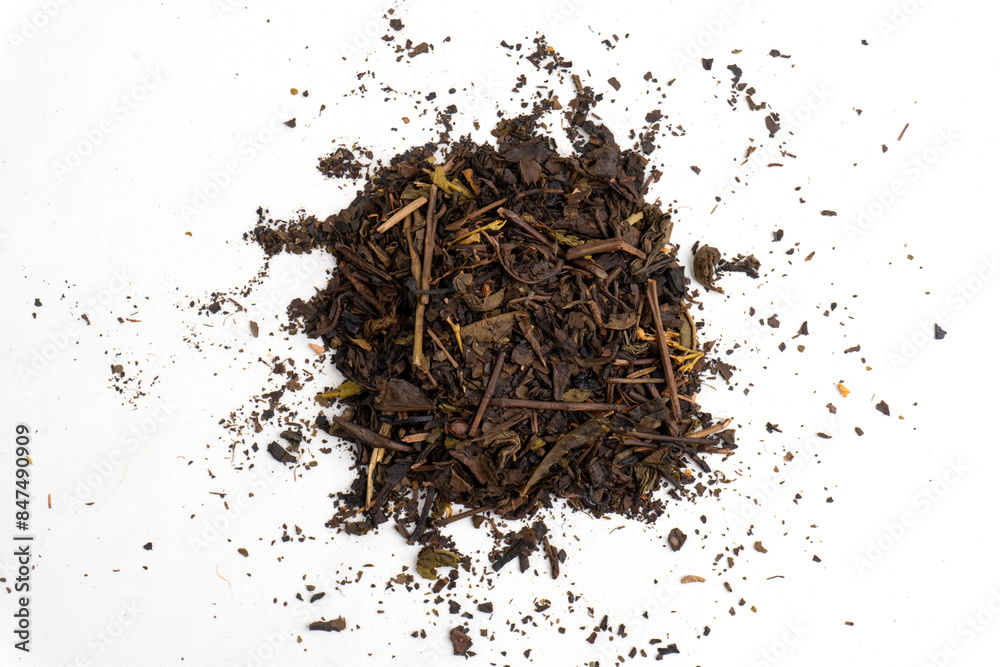 top view of pile of scattered dried tea leaves isolated white background top view of pile of scattered dried tea leaves isolated white background