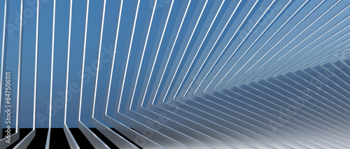 Photos A bunch of metal rods arranged in a curved shape against a blue background