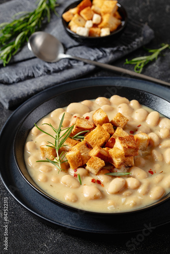 Εκτύπωση καμβά rosemary garlic creamy white bean soup in bowl