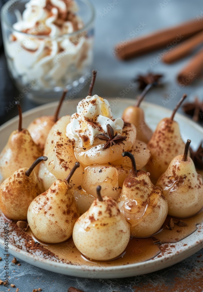 Poached Pears With Whipped Cream and Star Anise on a White Plate Poached Pears With Whipped Cream and Star Anise on a White Plate