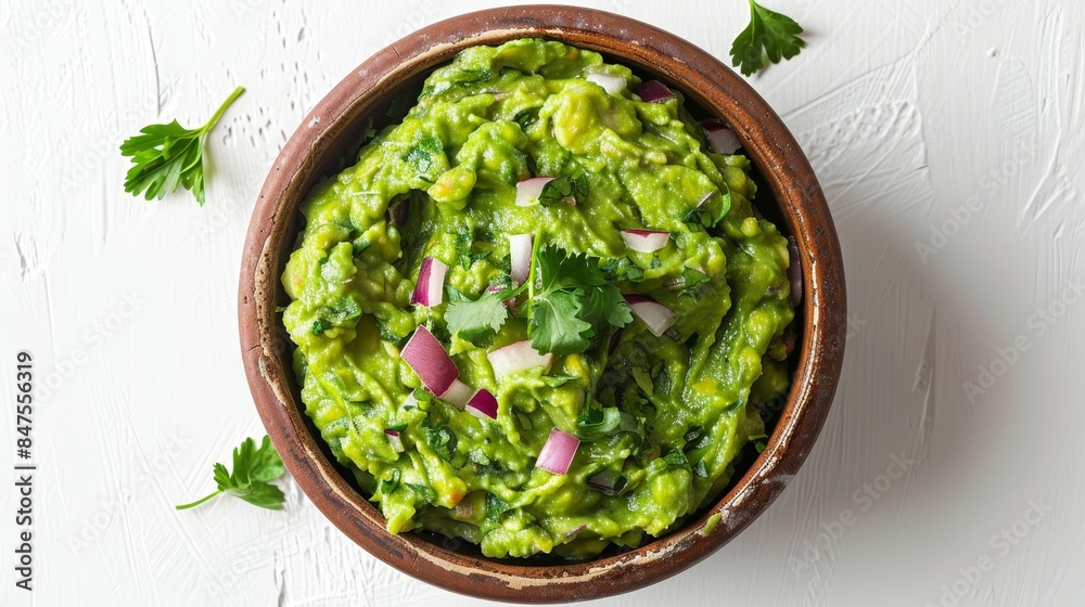 Guacamole close-up from above, rich green texture with herbs and onions mixed, served in a traditional bowl, isolated on a plain white background Guacamole close-up from above, rich green texture with herbs and onions mixed, served in a traditional bowl, isolated on a plain white background
