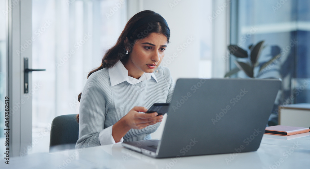 Business, woman and phone with laptop in office for reading client contact info, administration and mobile app. Professional, employee and technology for project management or networking at workspace Business, woman and phone with laptop in office for reading client contact info, administration and mobile app. Professional, employee and technology for project management or networking at workspace