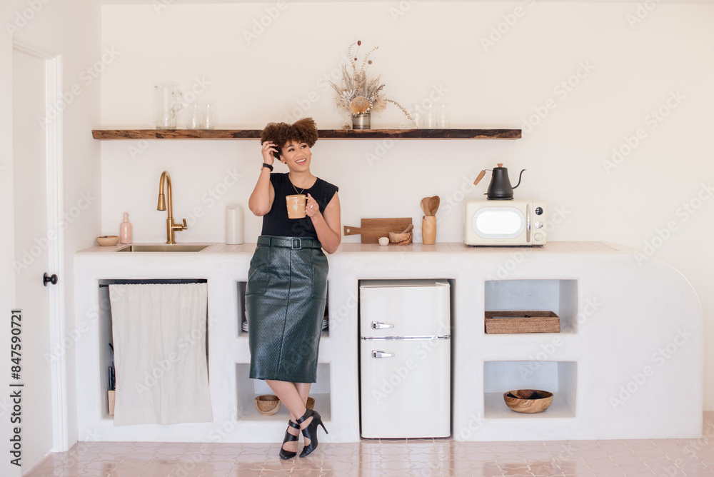 Wide shot of business women in adobe kitchen Wide shot of business women in adobe kitchen