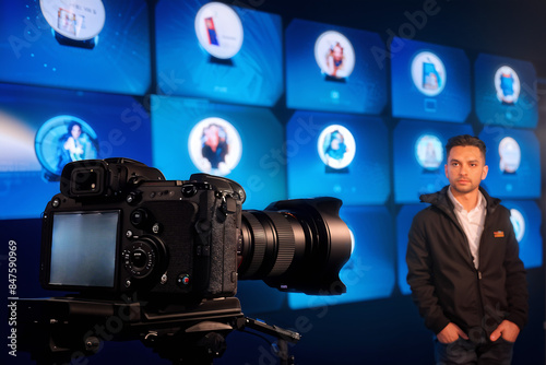 social media influencer on camera in front of a digital wall of influencer profiles