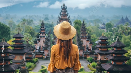 Ornate Buddhist Temples and Pagodas Nestled in the Lush Tropical Foliage of Bali s Scenic Landscape photo