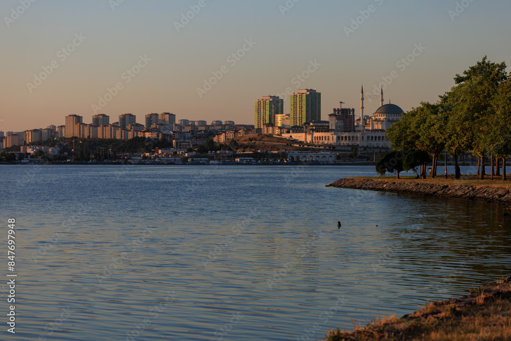 Obraz premium Evening sea view off the coast of Istanbul. Orange sunset sky 
