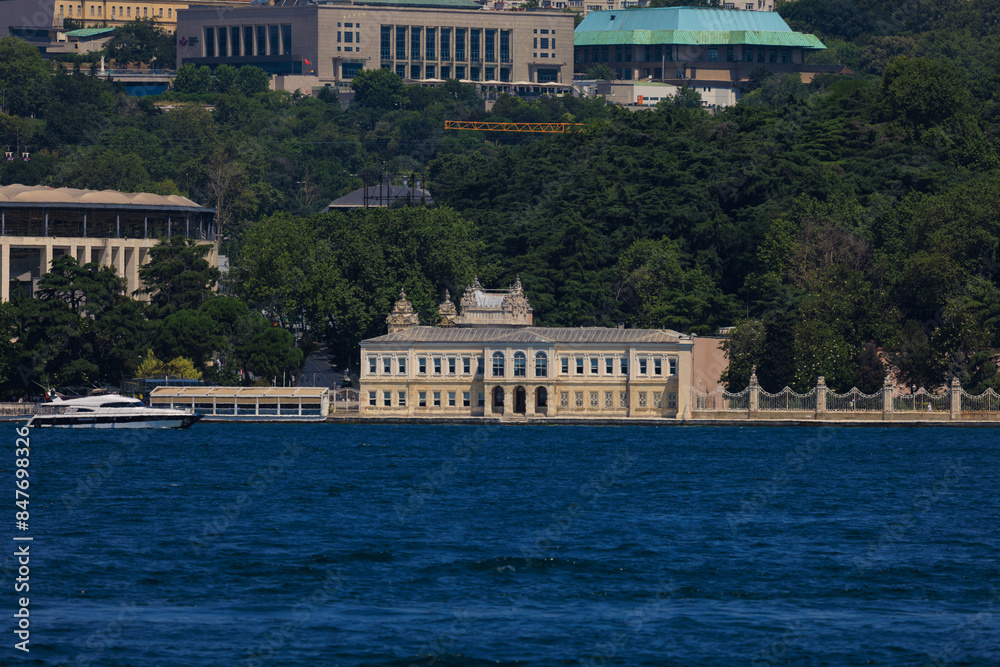 Fototapeta premium Blue seascape overlooking the coast. View of the Bosphorus in Istanbul city on sunny summer day, in a public place.