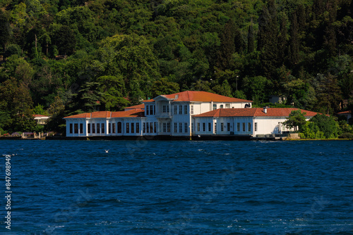Blue seascape overlooking the coast. View of the Bosphorus in Istanbul city on sunny summer day, in a public place.