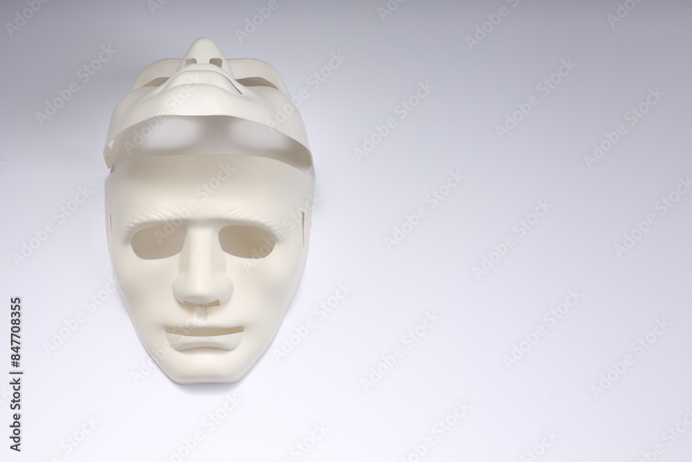 Theater arts. Two masks on white background, top view. Space for text Theater arts. Two masks on white background, top view. Space for text