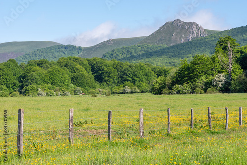 Rocky peak between fogs on a sunny day. Mendixuri. Roncesvalles-Burguete. Navarrese Pyrenees photo