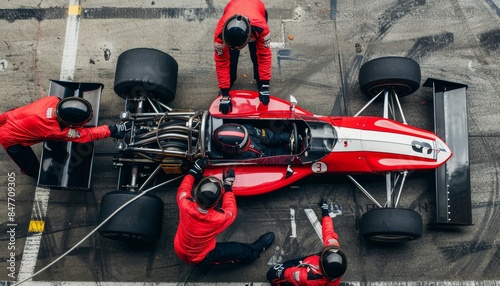 Formula one pit stop  red jumpsuit crew showcases teamwork in competitive racing