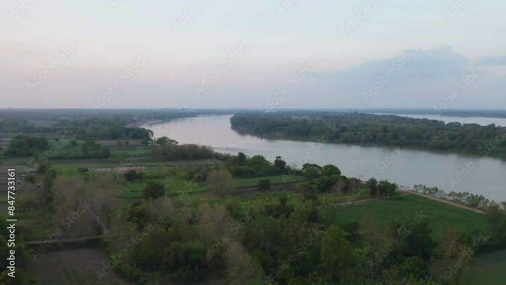 Aerial view of Mekong River with green mountain hill. Nature landscape background in Ubon Ratchathani, Thailand and Laos. Aerial view of Mekong River with green mountain hill. Nature landscape background in Ubon Ratchathani, Thailand and Laos.