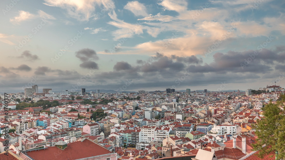 Fototapeta premium Panorama showing Lisbon famous aerial view from Miradouro da Senhora do Monte tourist viewpoint timelapse