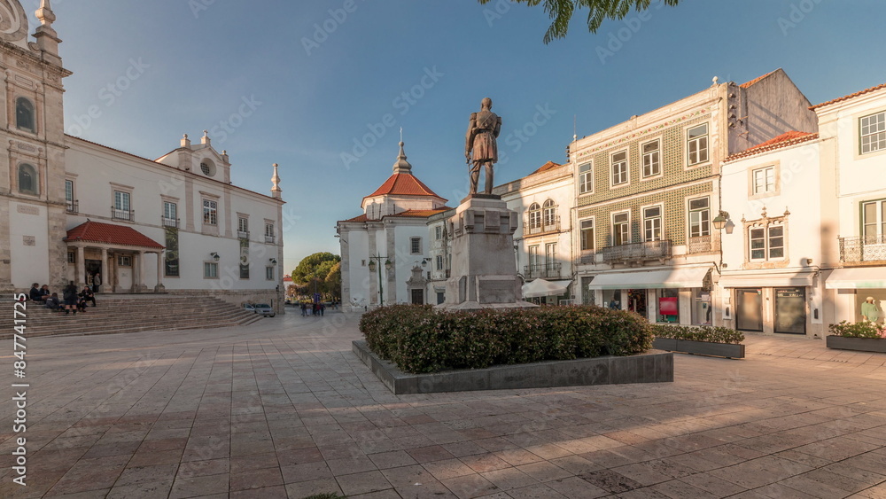Naklejka premium Panorama showing Sa da Bandeira Square with a view of the Santarem See Cathedral timelapse. Portugal