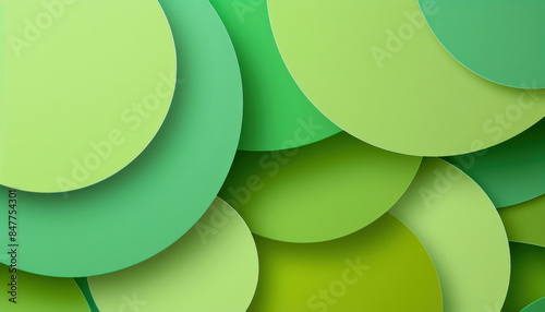Several green circles are arranged in a stack on a white background, forming a pattern