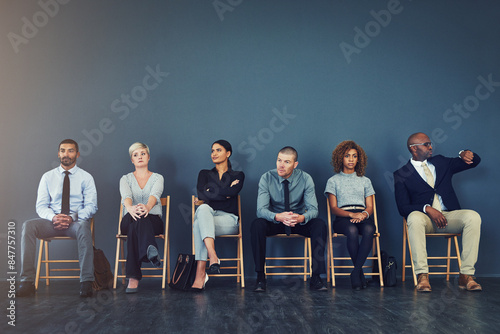 Business people, hiring and waiting in row for interview with recruitment process or employment opportunity. Diverse group, job seeker and impatient in line for HR meeting with mockup space or banner