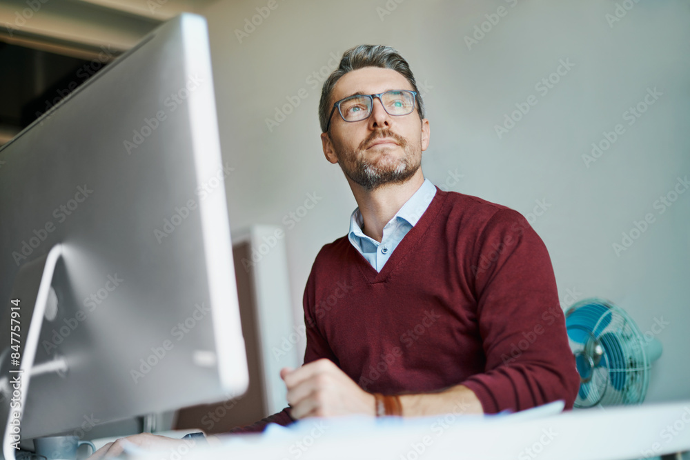Remote work, man and thinking with glasses for solution, response and research in home office. Male freelancer, technology and idea at desk for communication, review and planning on internet Remote work, man and thinking with glasses for solution, response and research in home office. Male freelancer, technology and idea at desk for communication, review and planning on internet