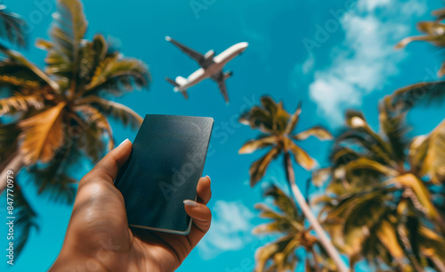 Person Holding Passport With Palm Trees and Airplane in Background on Sunny Day