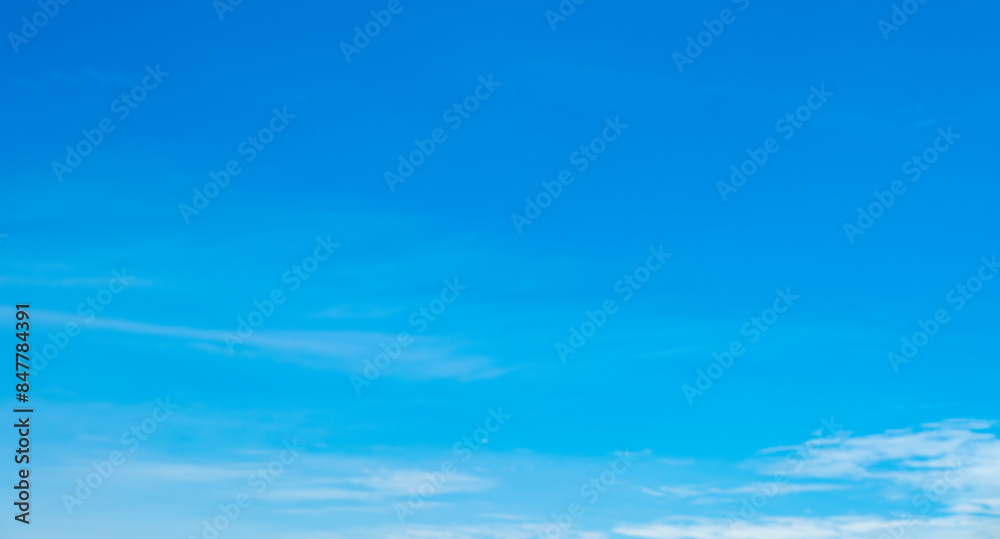 Obraz premium Clear sky background for summer vacation concept at ocean and summer sea water with sunlight of beautiful cloudy sky.concept 
