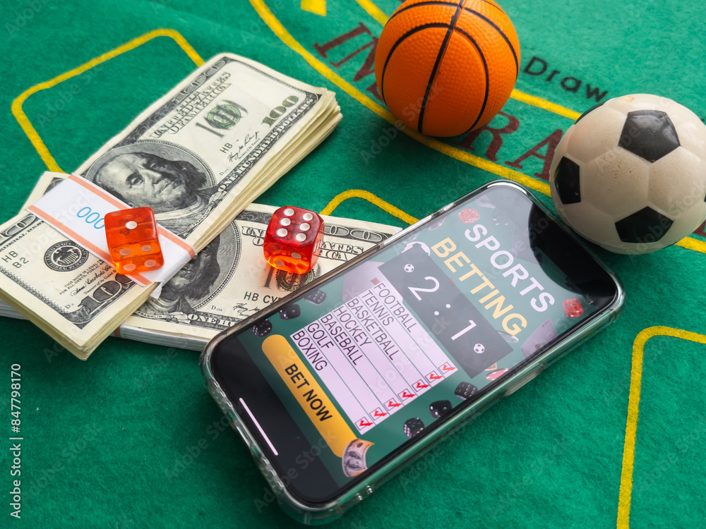 online casino smartphone with poker chips device over green table online casino smartphone with poker chips device over green table