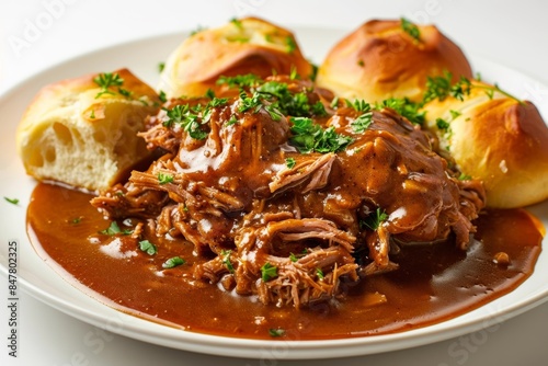 Mouthwatering BBQ Pulled Pork with Savory Gravy on Warm Dinner Rolls