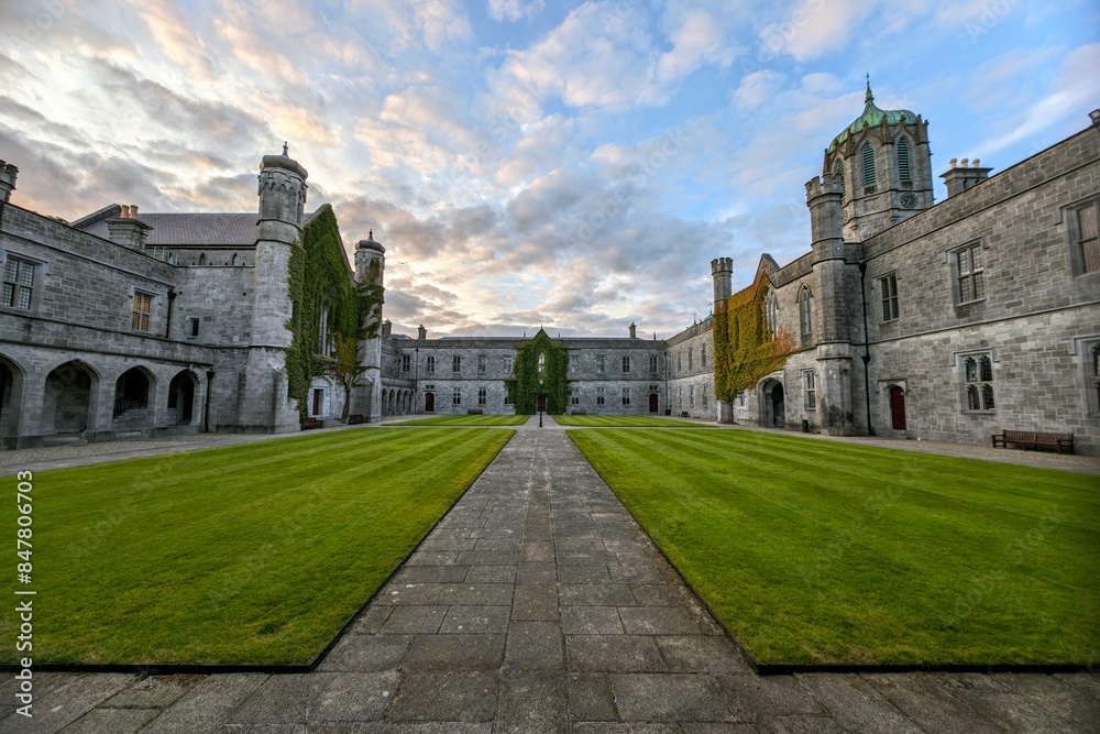 Obraz premium The University of Galway, quadrangle at sunset in Ireland, amazing architecture and landmark, medieval building