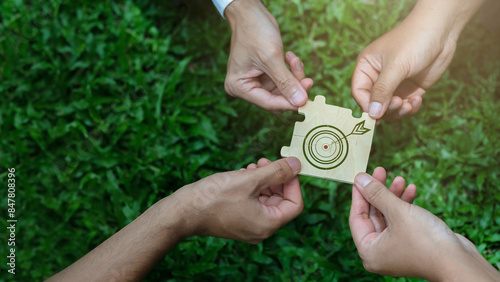 world environment day Global teamwork goals for a sustainable environment Businessmen join forces to puzzle together ideas to help save the world.