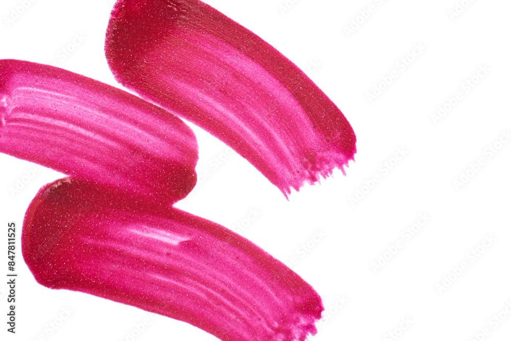Pink shimmering lipstick texture stroke isolated on white background. Cosmetic product swatch Pink shimmering lipstick texture stroke isolated on white background. Cosmetic product swatch